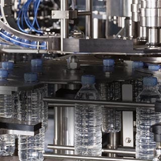 Portioning sausage fillings in fish and meat processing